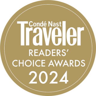 A gold circular logo features the text "Condé Nast Traveler Readers' Choice Awards 2022."